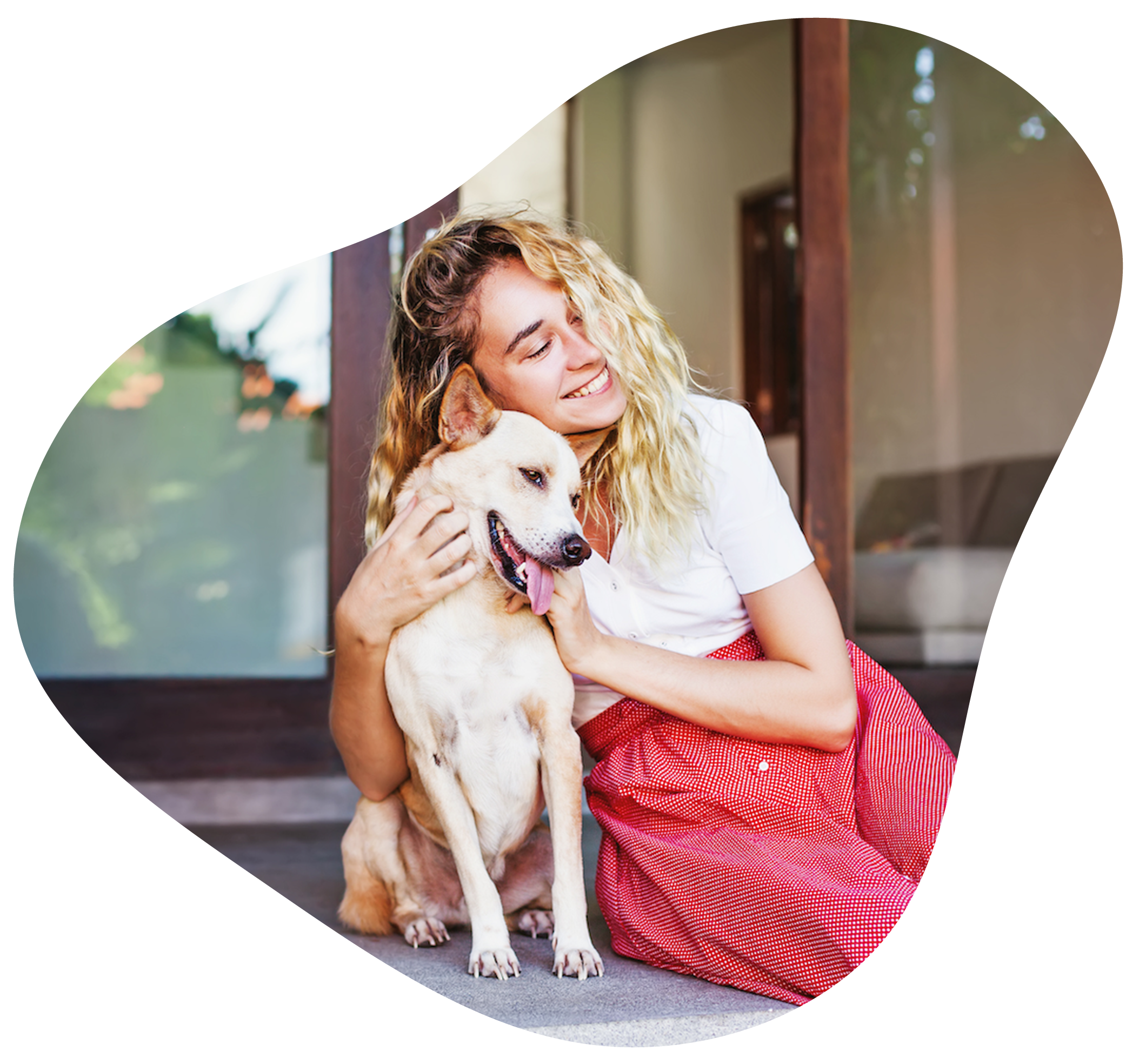 woman hugging dog